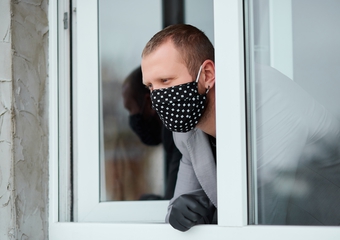 gr_383_man-in-black-mask-and-medicine-gloves-looking-from-ldqnxzc.jpg